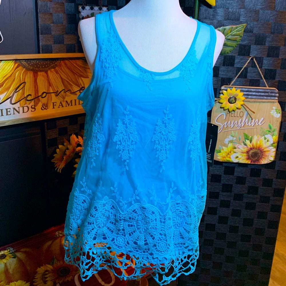 Woman’s dress tank top blue with lace overlay.